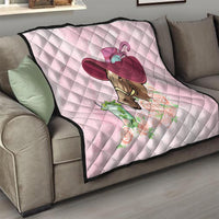 Pink quilt with quilted diamond pattern, horse head graphic and roses