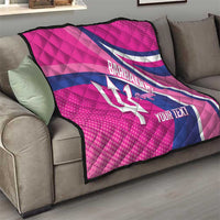 Pink and navy quilt draped on sofa with white trident, Barbados Royals emblem, YOUR TEXT