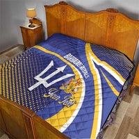 Blue and yellow Barbados Royals quilt on a bed, featuring trident emblem and custom text.