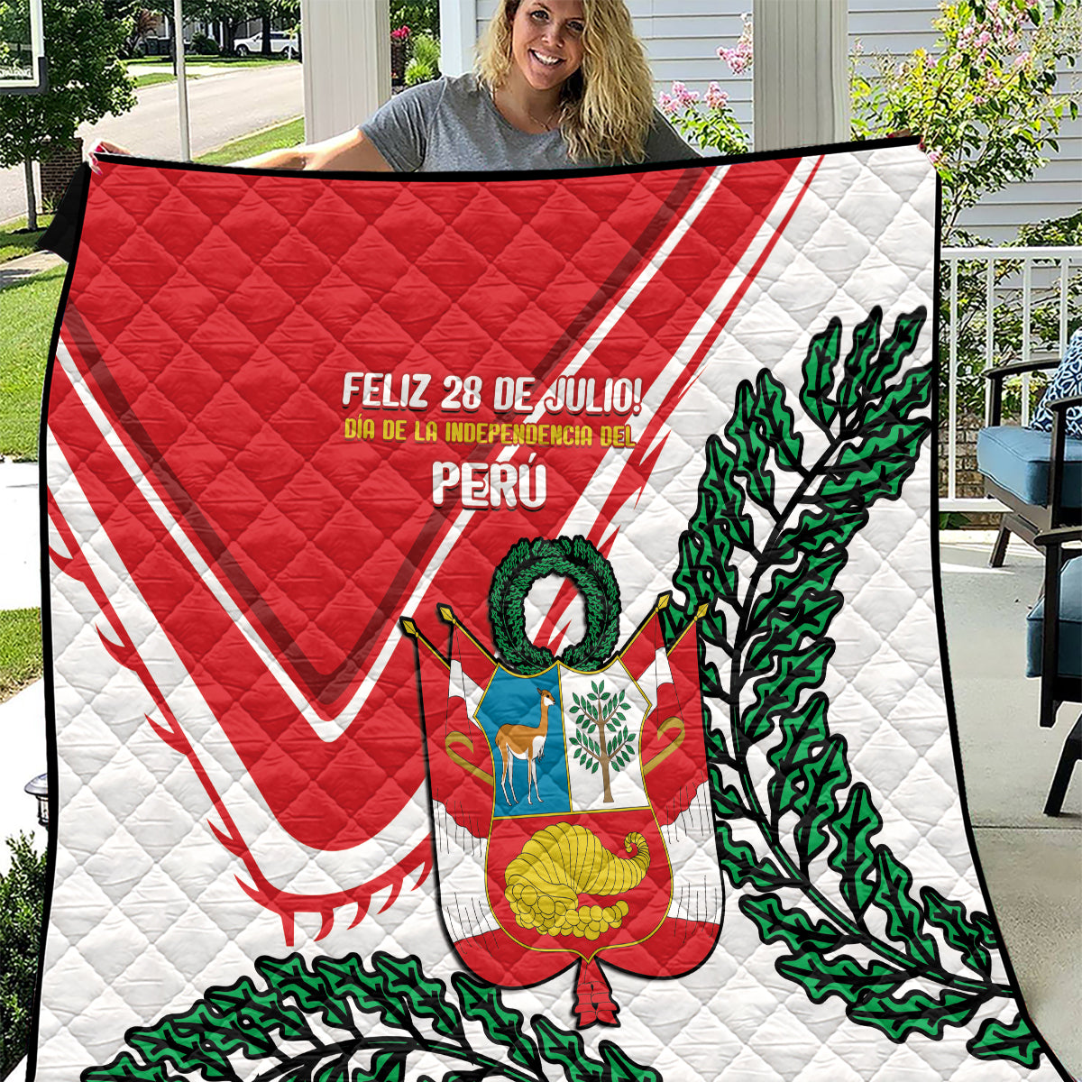 Peru Independence Day quilt with red-and-white diagonal design, coat of arms, green trees