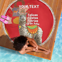 Red round beach blanket with white fringe, 'YOUR TEXT' and llama graphic, laid on wood