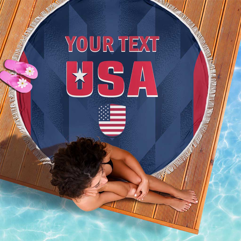 Blue circular beach blanket with fringe, USA graphic and 'YOUR TEXT' view from above