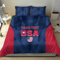 Blue and red USA bedding set with “YOUR TEXT” and shield graphic, centered on bed
