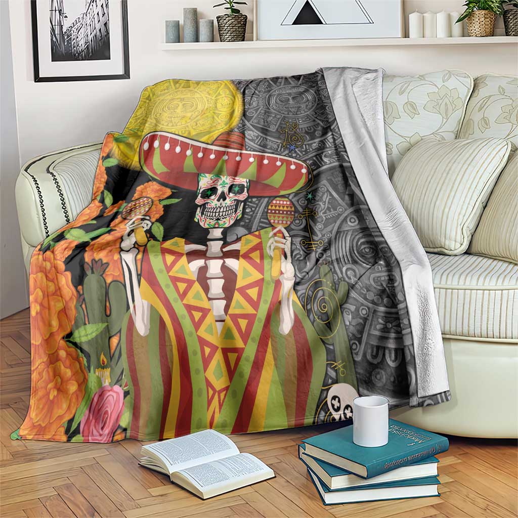 Dia de los Muertos blanket over bedspread; sombrero skeleton with flowers and Aztec motifs