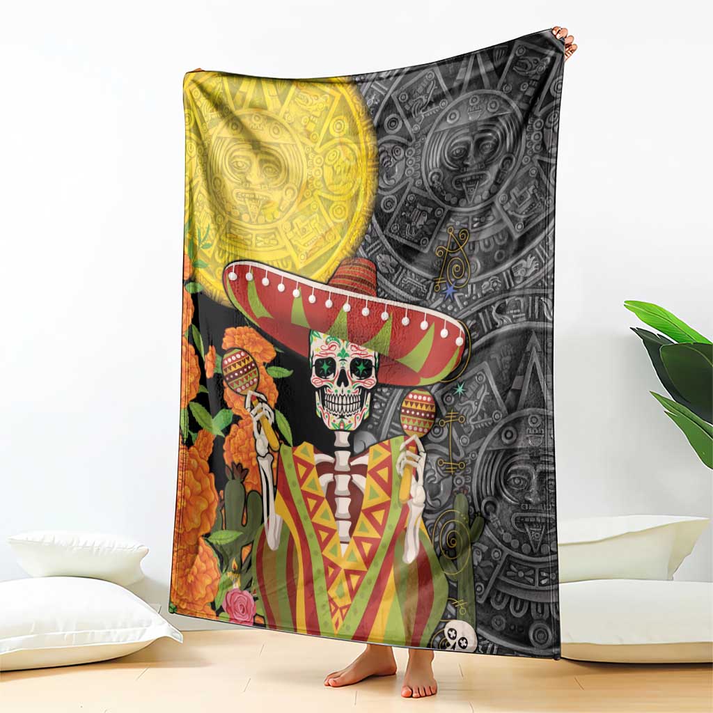 Dia de los Muertos blanket with black and gold skull, sombrero, and Aztec pattern art