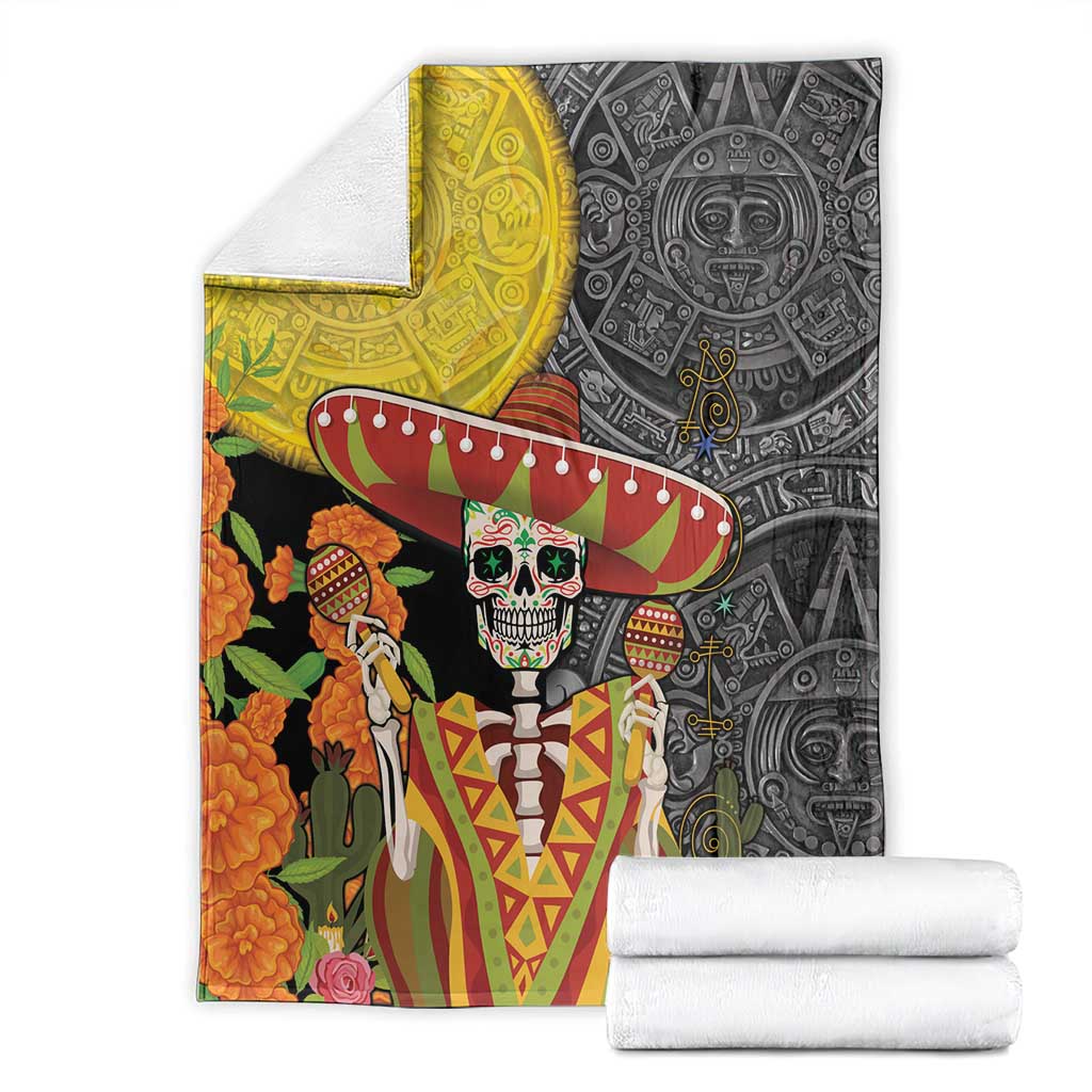 Dia de los Muertos blanket folded with gold and black skull sombrero Aztec artwork