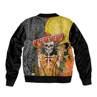 Unisex black bomber jacket back with skull in sombrero and floral aztec patterns, ribbed hem
