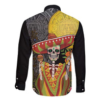 Black long sleeve button shirt with back Aztec-style skull design and sombrero graphic