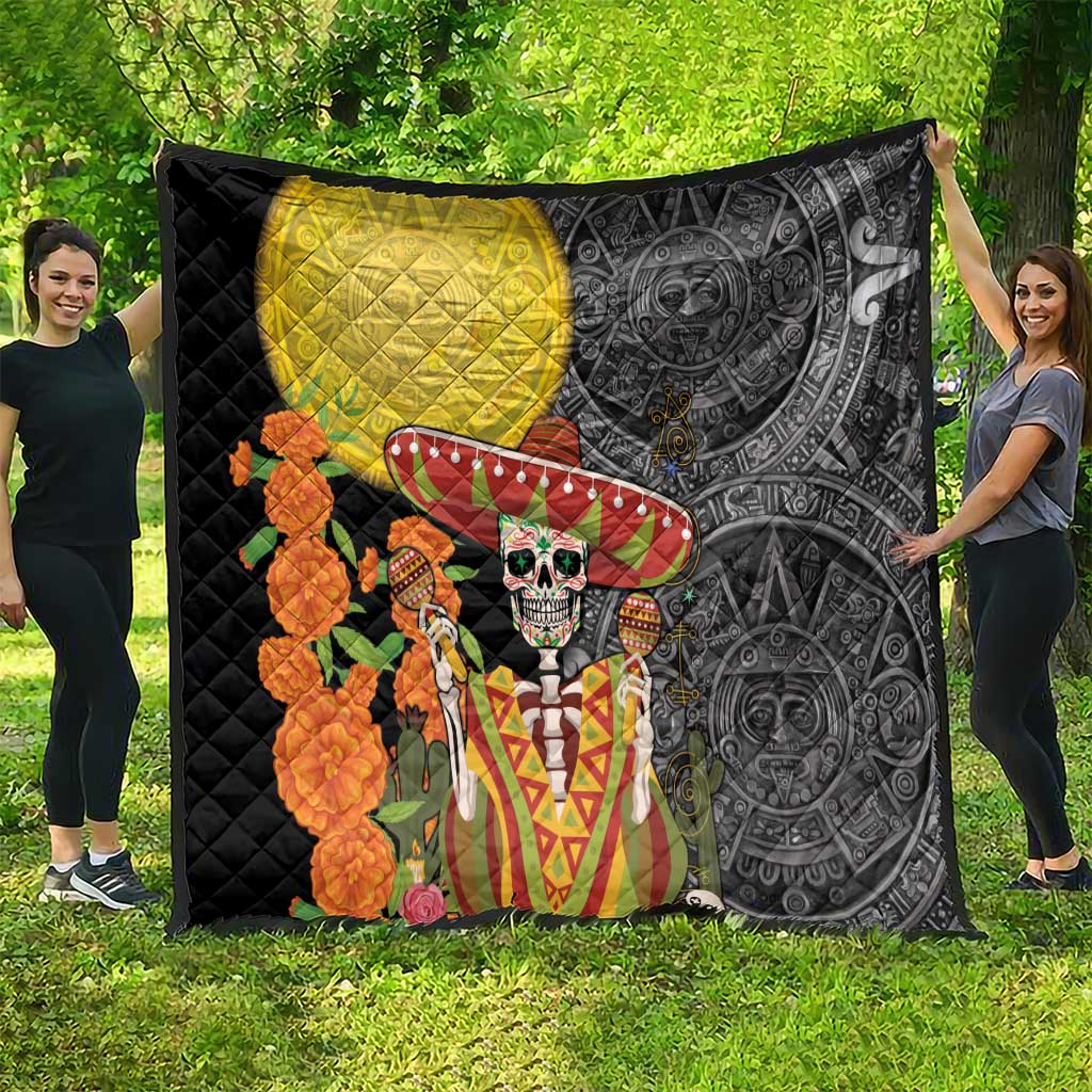 Large black quilt outdoors with yellow moon panel, sugar skull in sombrero and orange flowers