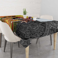 Black tablecloth with Dia de los Muertos sugar skull and Aztec pattern