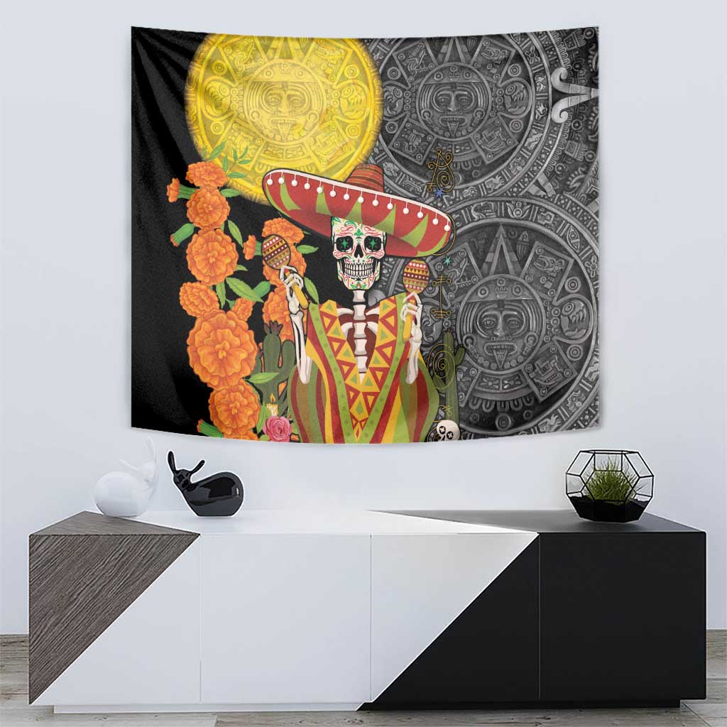 Black tapestry with golden sun disc, skull in sombrero, Aztec face patterns, orange blossoms