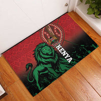 Red rubber doormat with green lion and Kenya text, laid in entryway