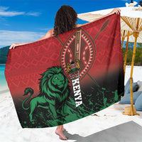 Red and green Kenya lion emblem sarong with circular crest and vertical lettering