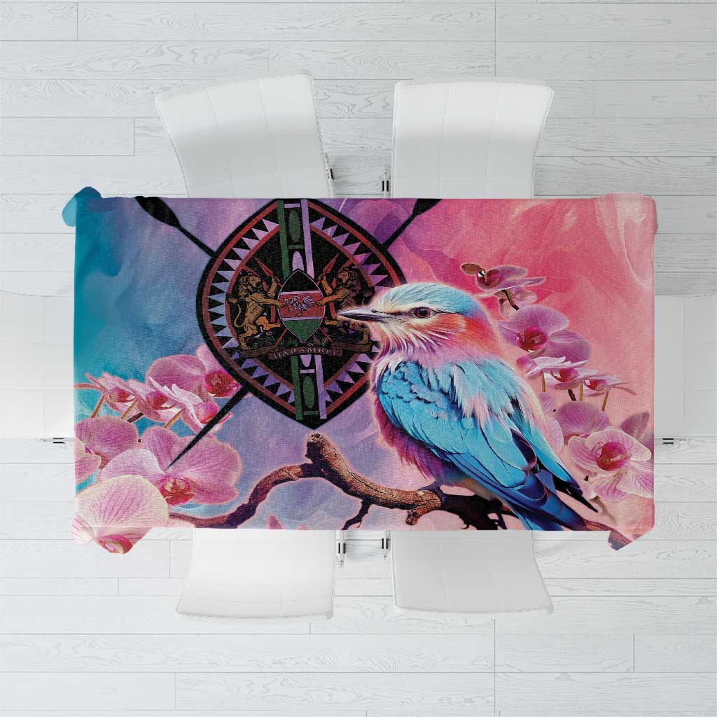 Pink floral tablecloth with orchid blooms and a coat of arms crest design