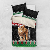 Flat-lay Christmas bedding set: lion Santa duvet with two pillowcases in black, red, green