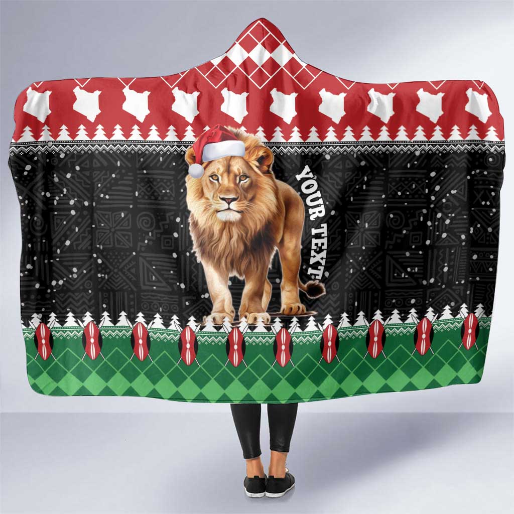 Hooded Christmas blanket with lion graphic, red plaid hood, black and green holiday pattern