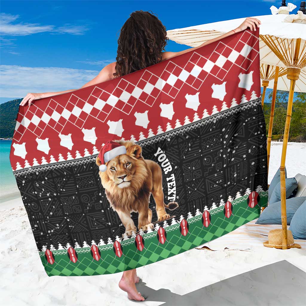 Red, black and green Christmas lion sarong with Santa silhouettes and festive border