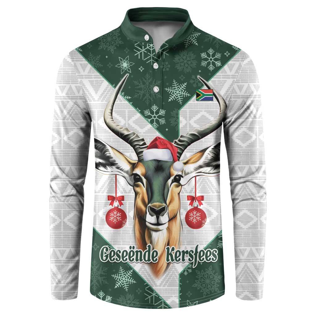 Green button-up sweatshirt with festive springbok graphic, snowflakes, and red ornaments