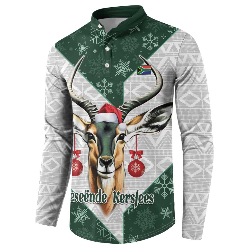 Green button-up sweatshirt with springbok head graphic, red hanging baubles, long sleeves
