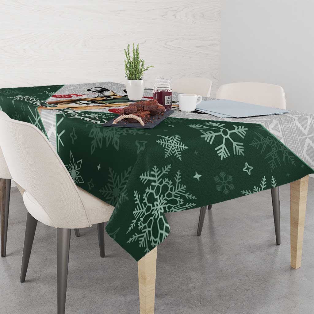 Green Christmas tablecloth with white snowflakes and subtle star motifs