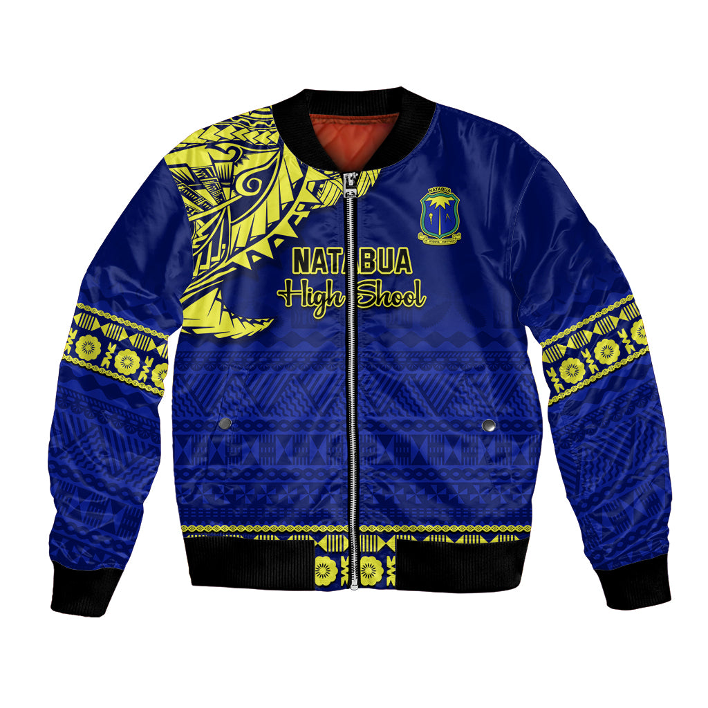 Blue bomber jacket with yellow tapa pattern, front zipper, ribbed cuffs