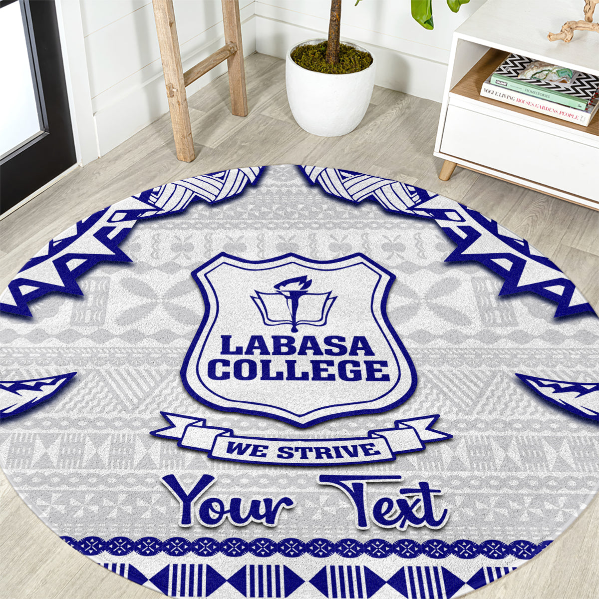 Round college carpet with gray tapa pattern, blue crest, 'WE STRIVE' and 'Your Text'