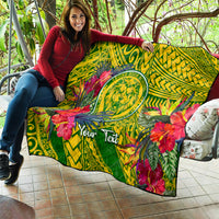 Green tropical quilt spread on patio with lion crest, hibiscus blooms, and Your Text