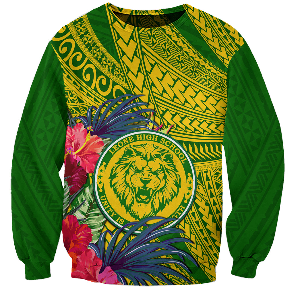 Green pullover sweatshirt with lion crest and tropical floral print on front