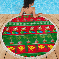 Round holiday beach blanket showing red and green swirls, stockings, and white fringed edge