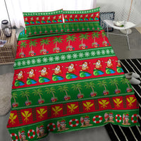 Christmas bedding set featuring red and green palm trees, Santas, and holiday stripes; bed set