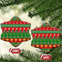 Ceramic snowflake-shaped Christmas ornament with red-and-green tropical holiday stripes