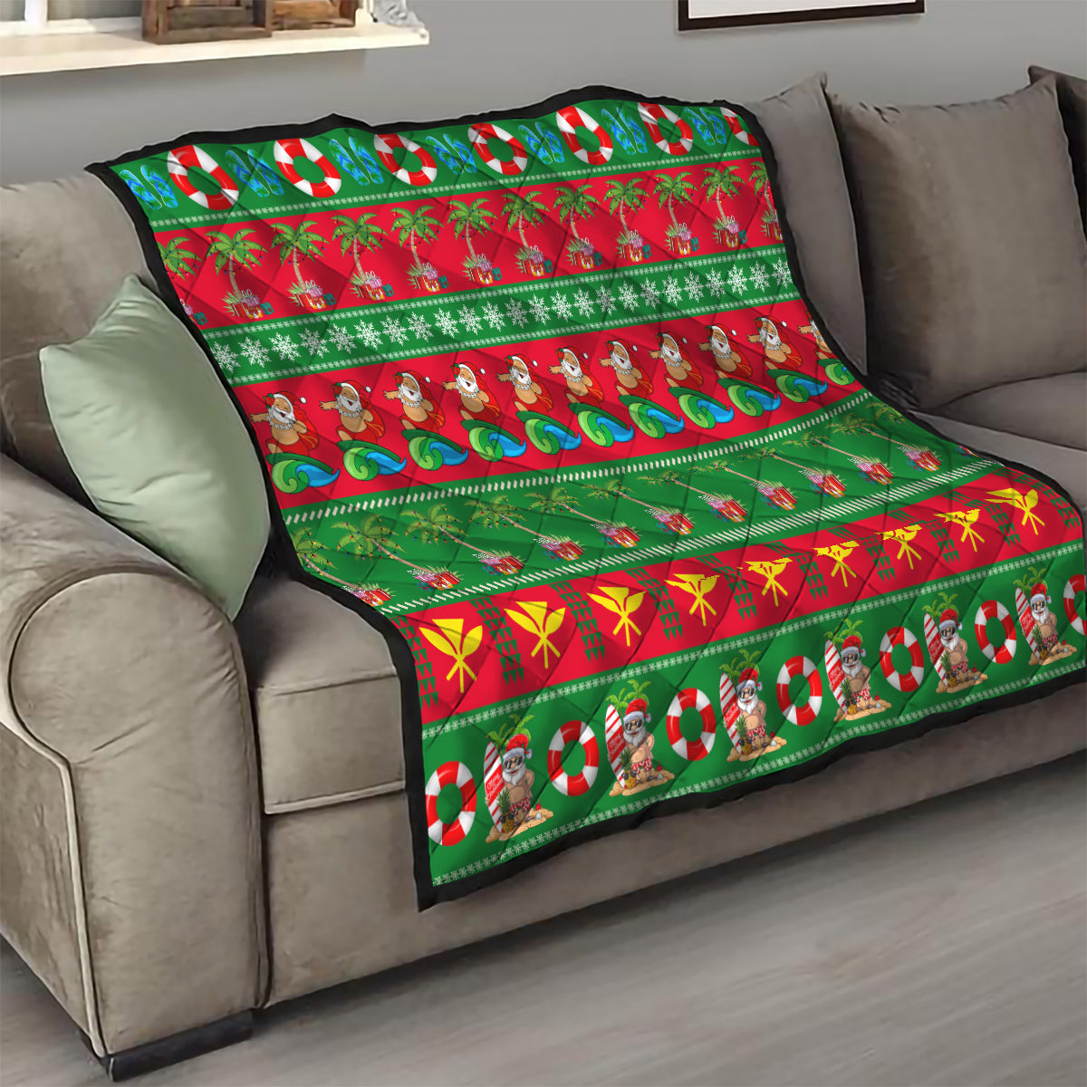 Hawaiian Christmas quilt on couch, green and red striped pattern with palm trees, waves, and candy canes