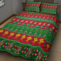 Green Christmas quilt and two pillow shams with tropical fruit, candy, and palm print