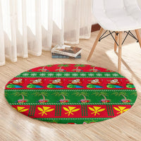 Round green holiday rug with red border, cartoon surf figures, gift and snowflake bands