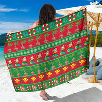 Green holiday Christmas sarong with red Santa, tree, and candy cane border