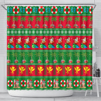 Green Christmas shower curtain with palm trees, red stripe bands, gift icons, and gingerbread.