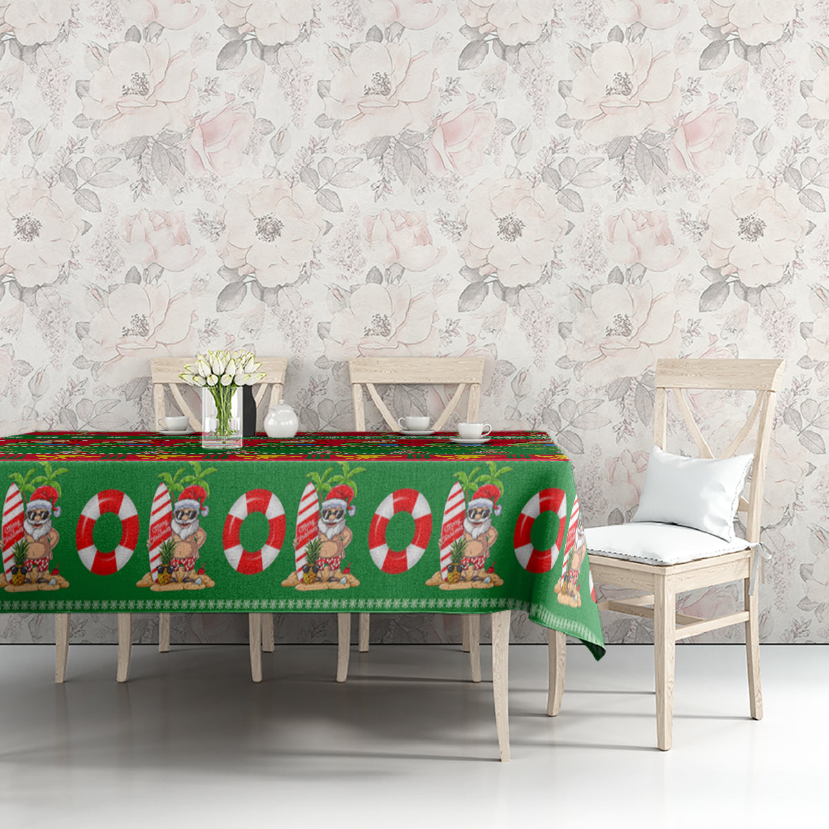 Green Christmas tablecloth over table with Santa and candy cane print, red accents