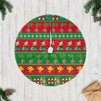 Round green Christmas tree skirt with red tropical print and center tie grommet