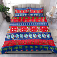 Blue holiday bedding set with matching pillowcases and red tropical festive print