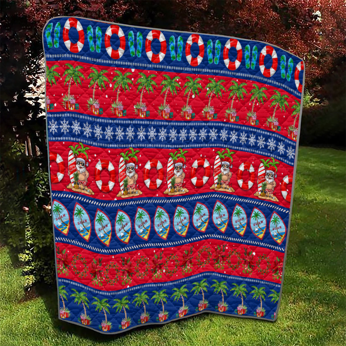 Red and blue Christmas quilt with Santa parade, palm trees, and holiday pattern bands