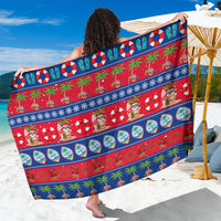 Christmas sarong with red, blue stripes, palm trees and holiday icons