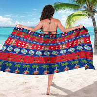 Christmas sarong shown from back: red and blue festive stripe pattern