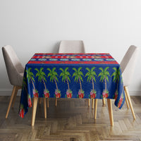 Guam Christmas tablecloth on square table with blue and red palm holiday design