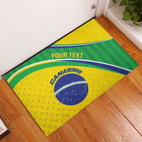 Yellow rubber doormat, angled, with Brazil crest and custom text on green striped design