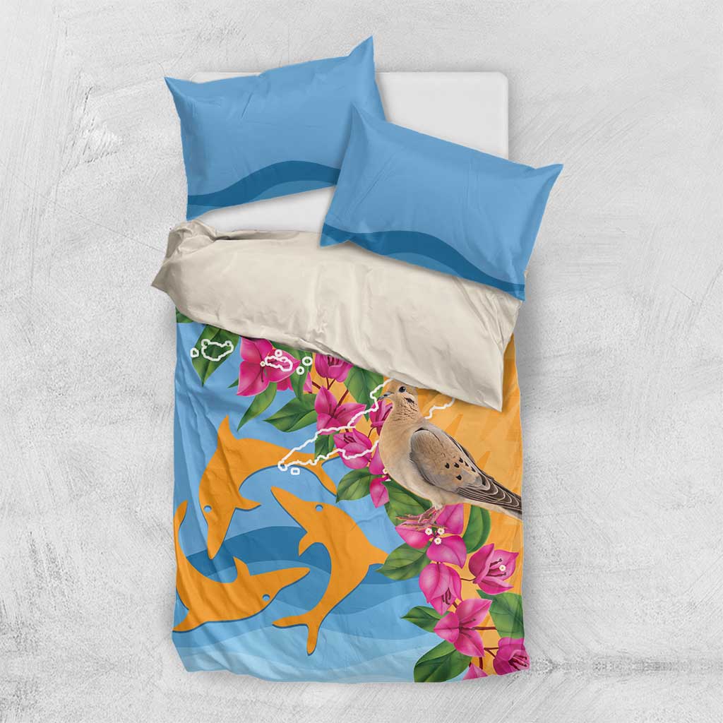 Duvet set with two blue pillowcases over light base, orange-blue dolphins and floral dove