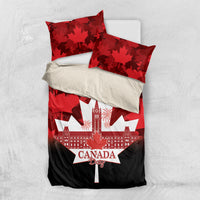 Red bedding set with red maple leaf pattern, Canada Day text, and matching pillowcases
