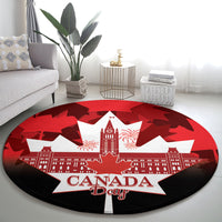 Red round Canada Day rug with white star, 'CANADA Day' lettering, maple leaf shapes