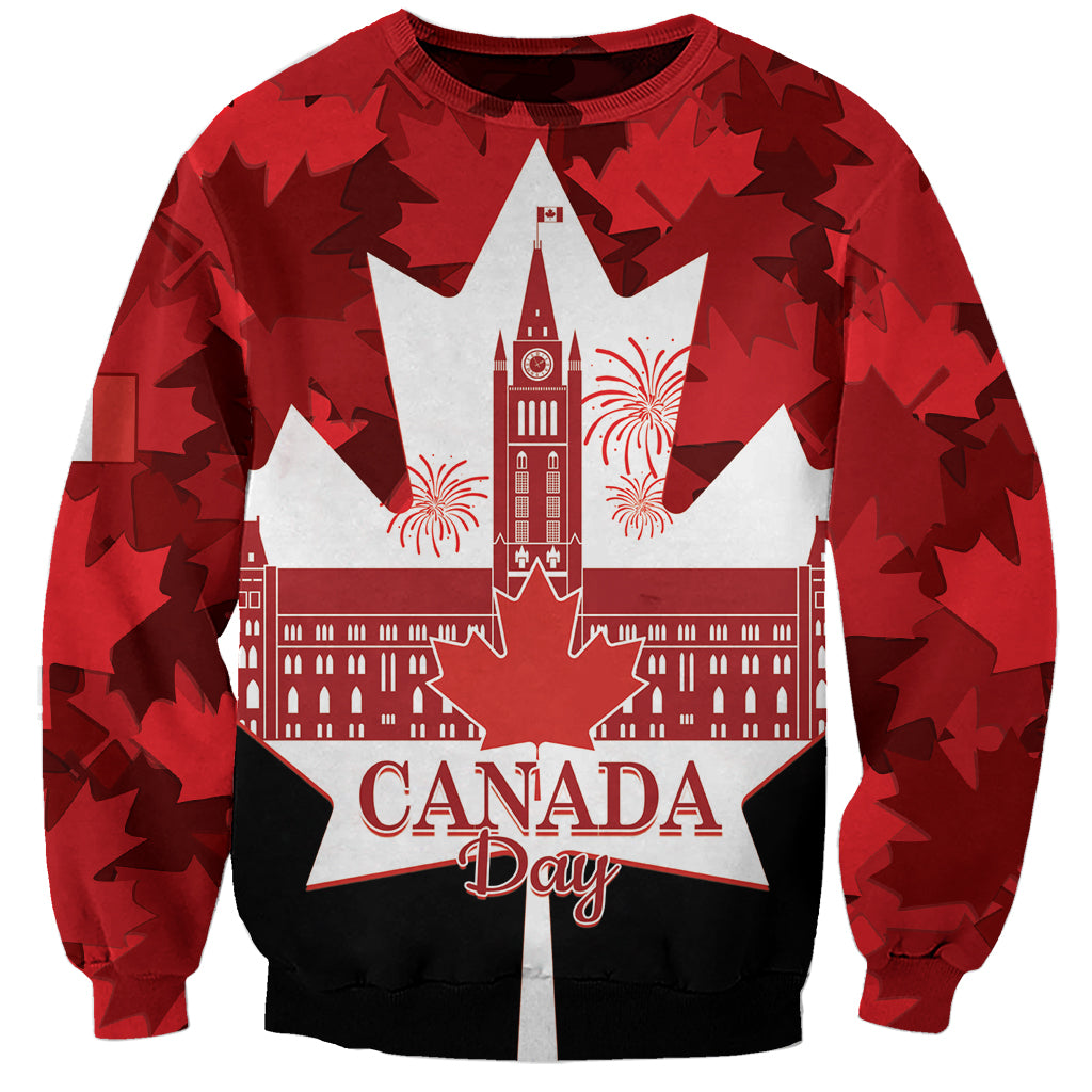 Red crewneck sweatshirt with Canada Day text over white maple-leaf star skyline