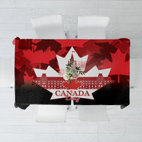 Red and black Canada Day tablecloth with maple leaves and Canada Day badge center