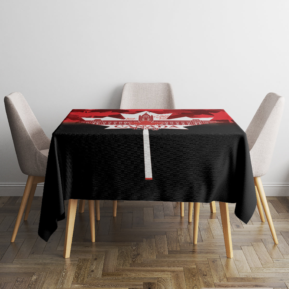 Canada Day tablecloth with red maple leaf design and white Canada Day emblem on table